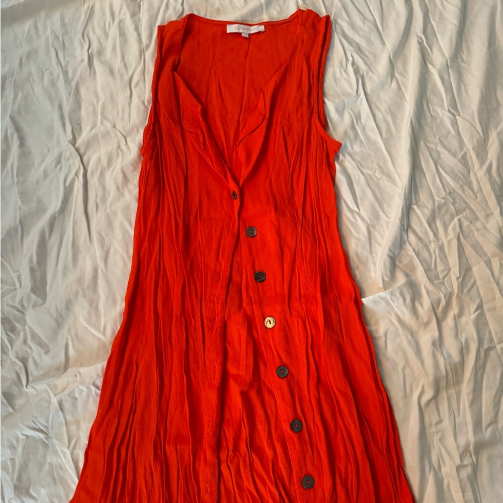 Orange tank dress with abalone buttons